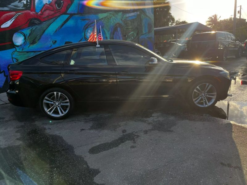 2014 BMW 328i Sedan - $9,495