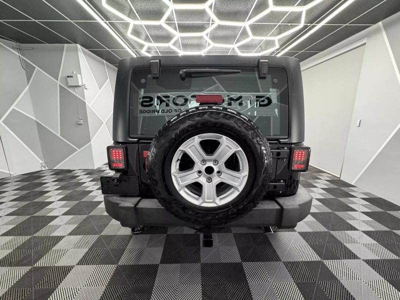 2012 Jeep Wrangler Unlimited Sport SUV 4D 6