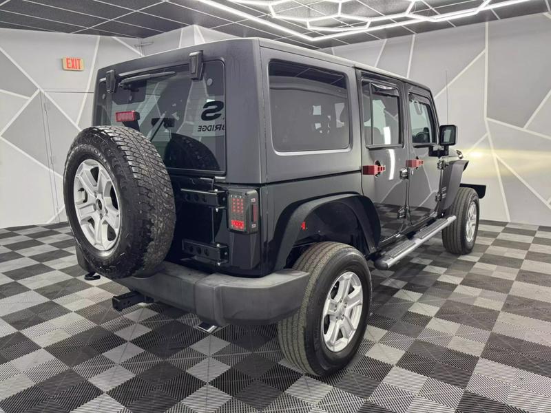 2012 Jeep Wrangler Unlimited Sport SUV 4D 7